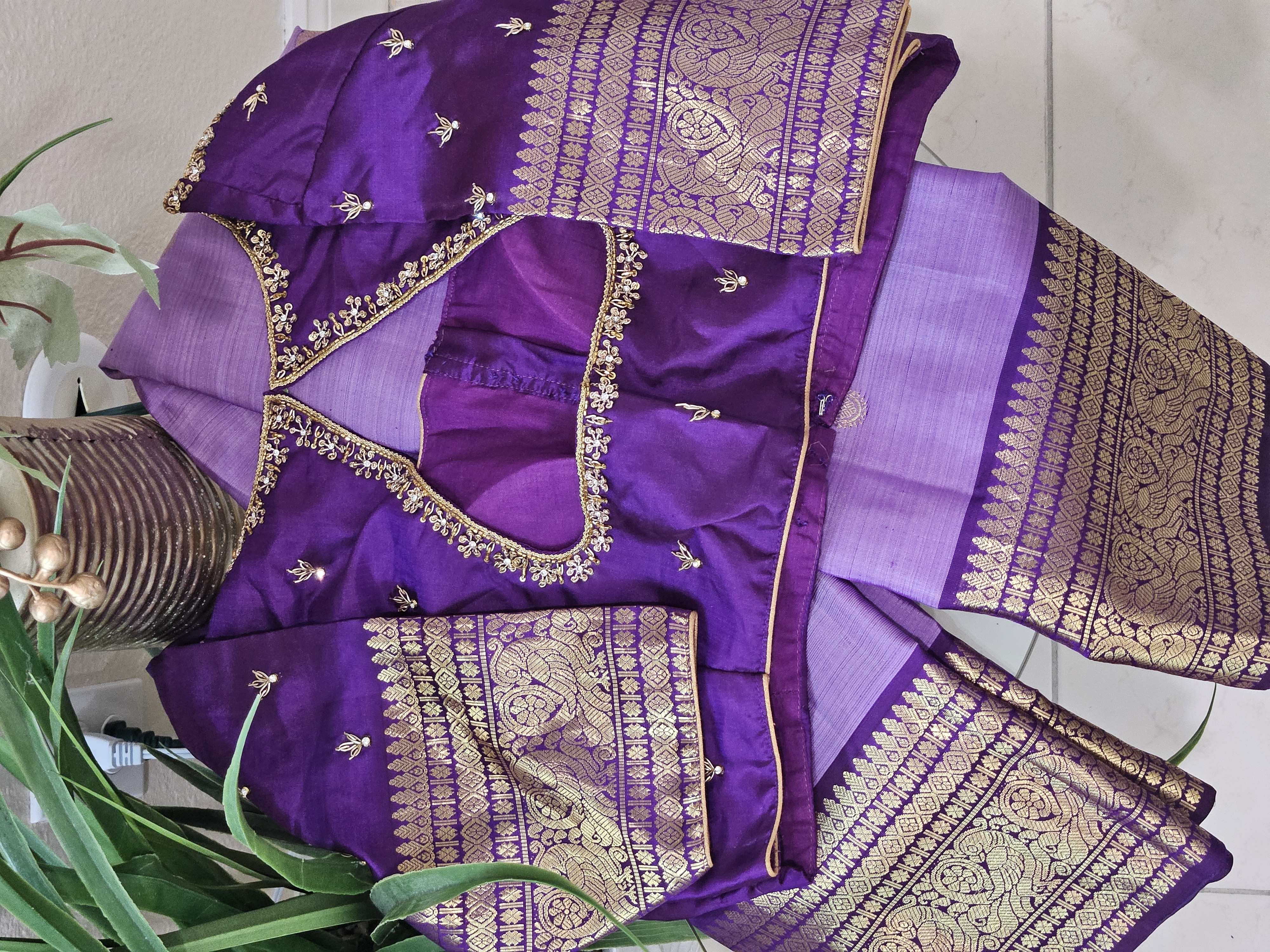 Radiant purple Kanchipuram silk saree with intricate 2gm pure gold zari work, traditional Indian wedding attire.