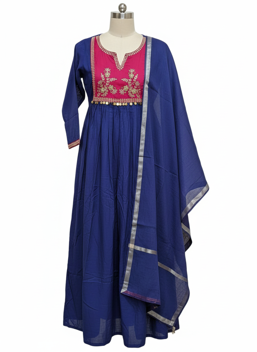 Indigo blue mul Chanderi suit set featuring a pink embroidered yoke, gold coin accents, and silver-bordered dupatta.