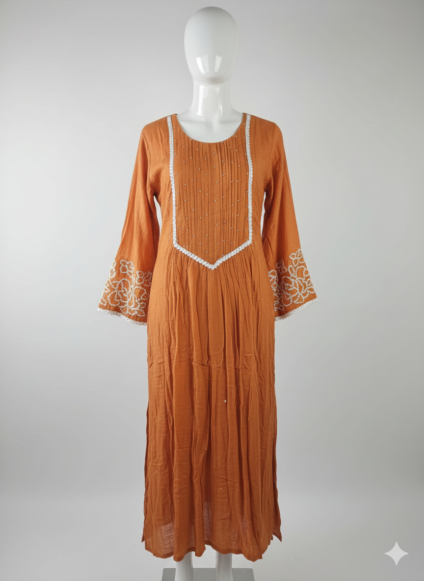 Burnt orange Chanderi silk kurta set with white embroidered sleeves and neckline, paired with matching dupatta, festive wear