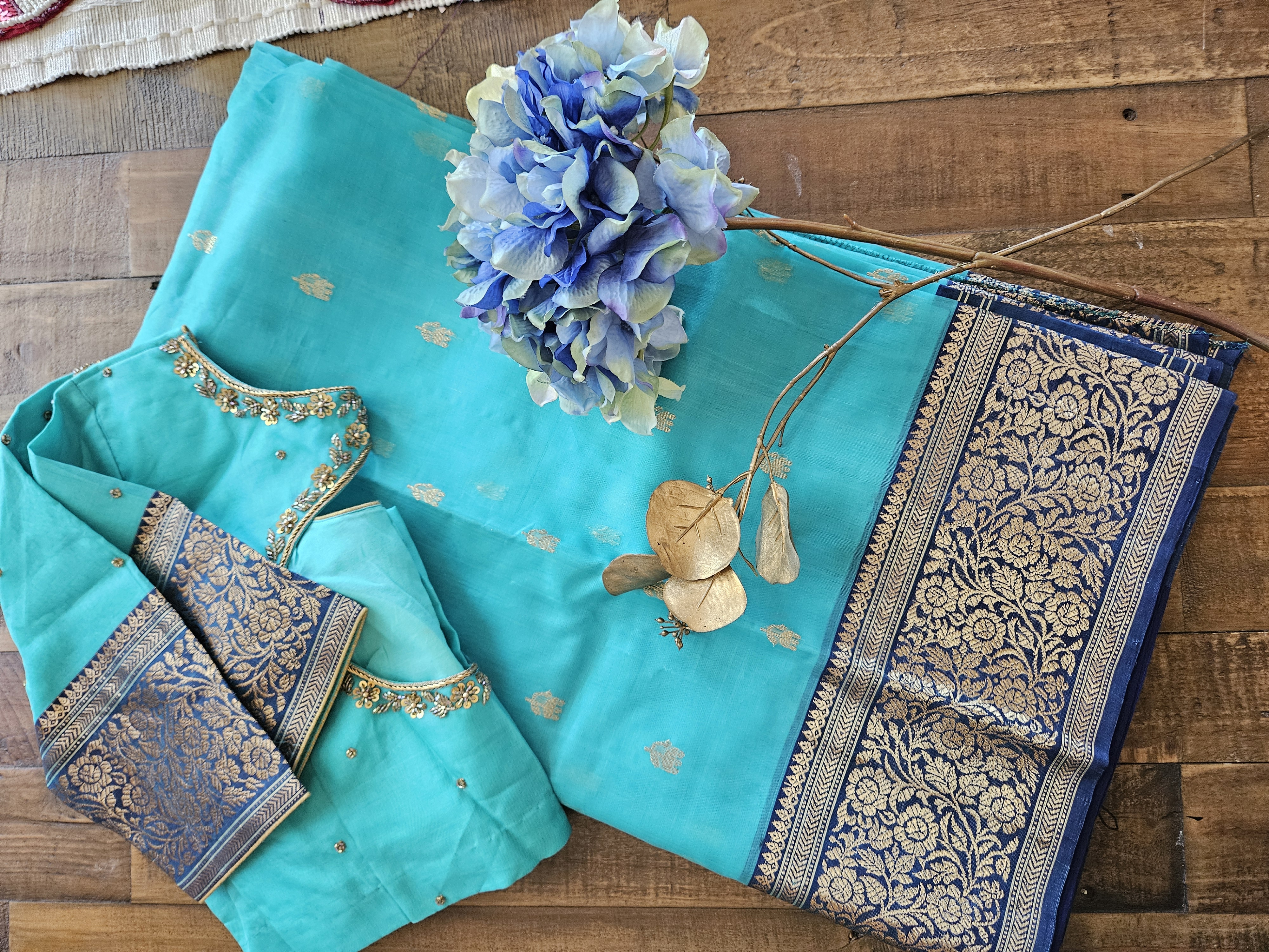Golden beige pure Chanderi silk saree with intricate handwoven gold zari borders and motifs, elegant and traditional design