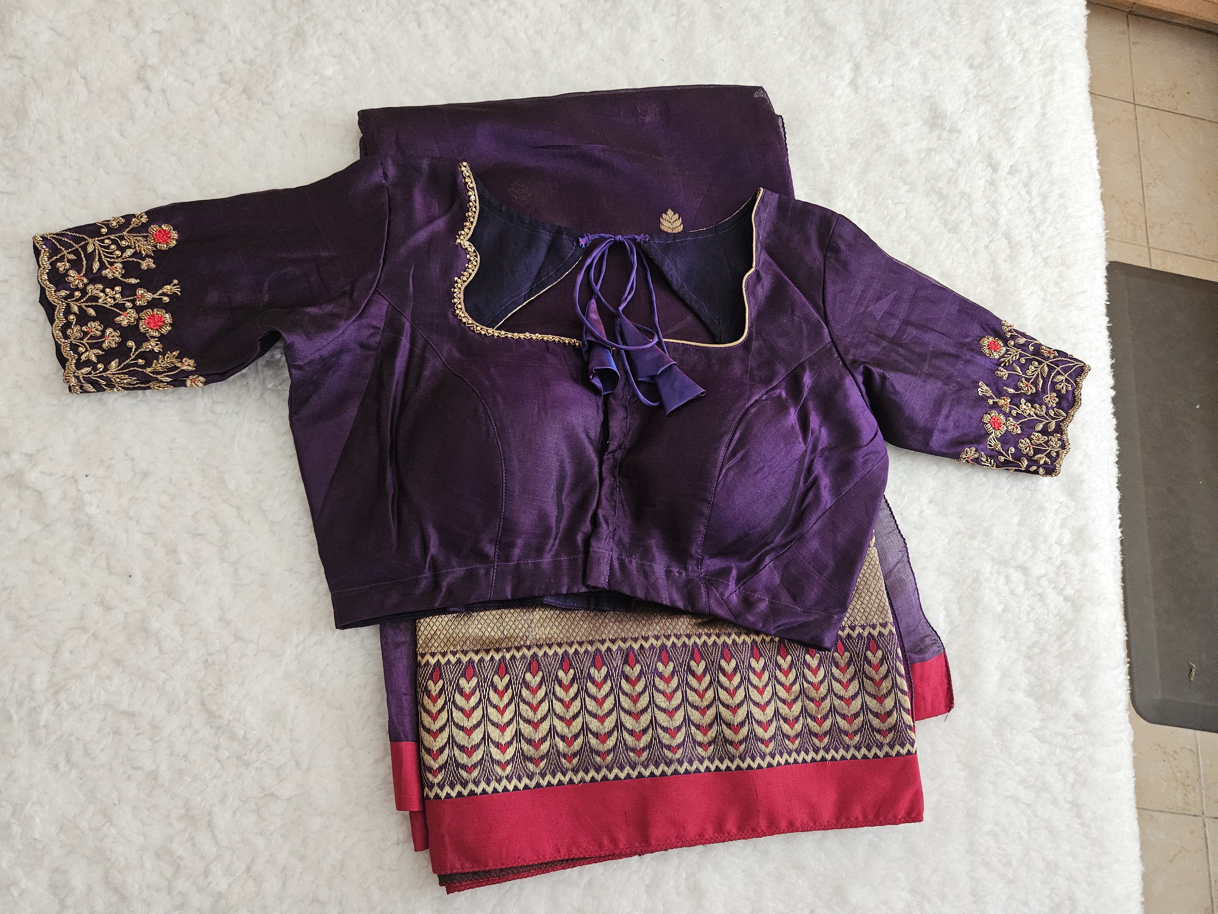 Pure Chanderi silk saree in deep purple with golden zari borders, handwoven Indian motifs, and matching embroidered blouse.