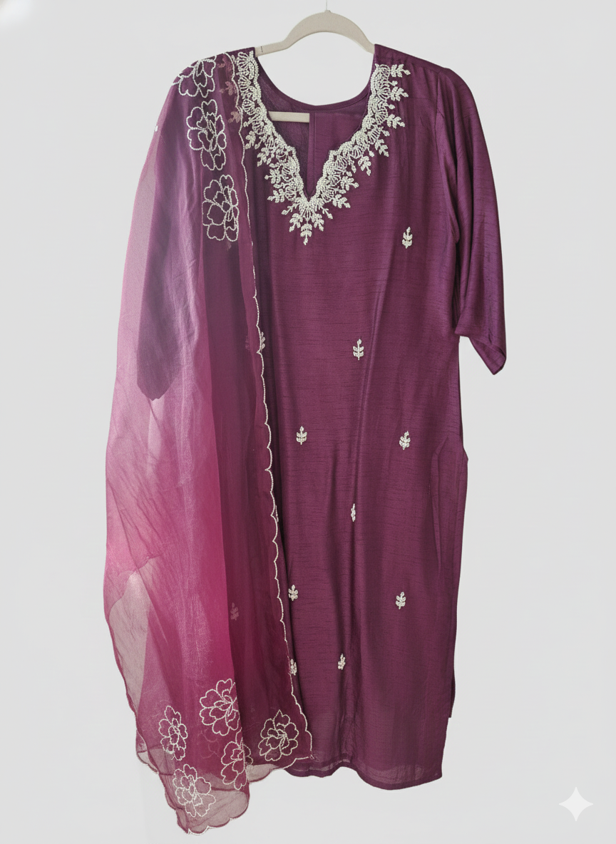 Deep wine Dola silk embroidered suit for women with white floral detailing and scalloped floral dupatta, elegant ethnic wear