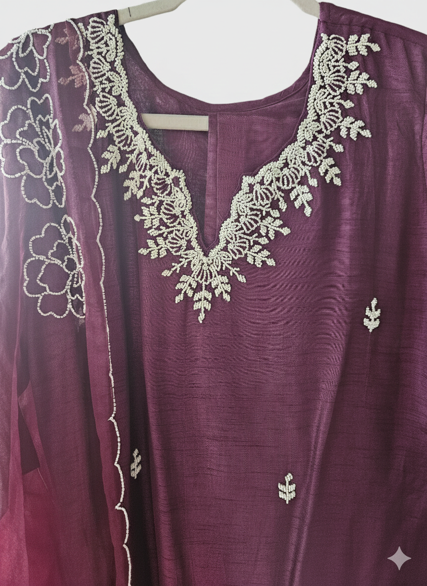 Deep wine Dola silk suit for women with intricate white embroidery, scalloped floral dupatta, and elegant neckline detailing