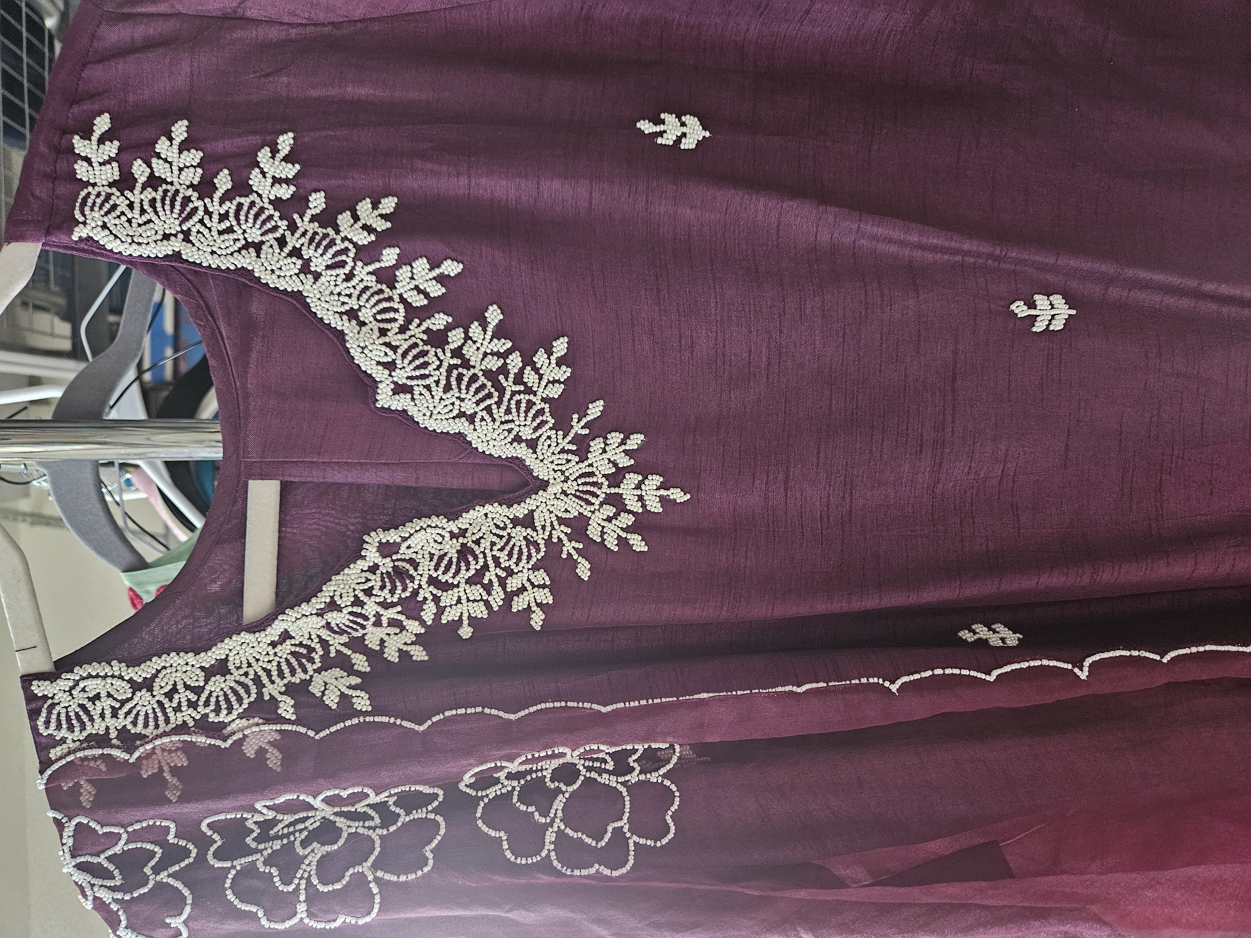 Deep wine Dola silk embroidered suit for women with white floral neckline, scalloped floral dupatta, and delicate motifs