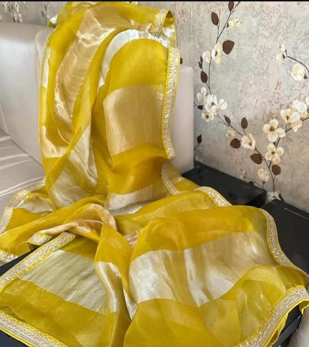 Pure Banarasi tissue silk saree in golden beige with zari work, featuring a sheer finish and elegant festive design.