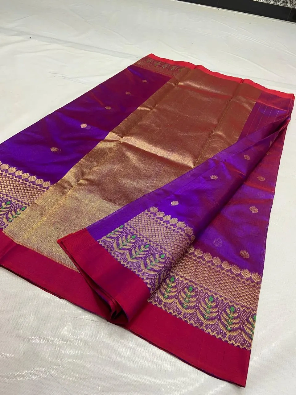 Pure Chanderi silk saree in golden beige with purple and red borders, zari work, and intricate maggam blouse detailing.