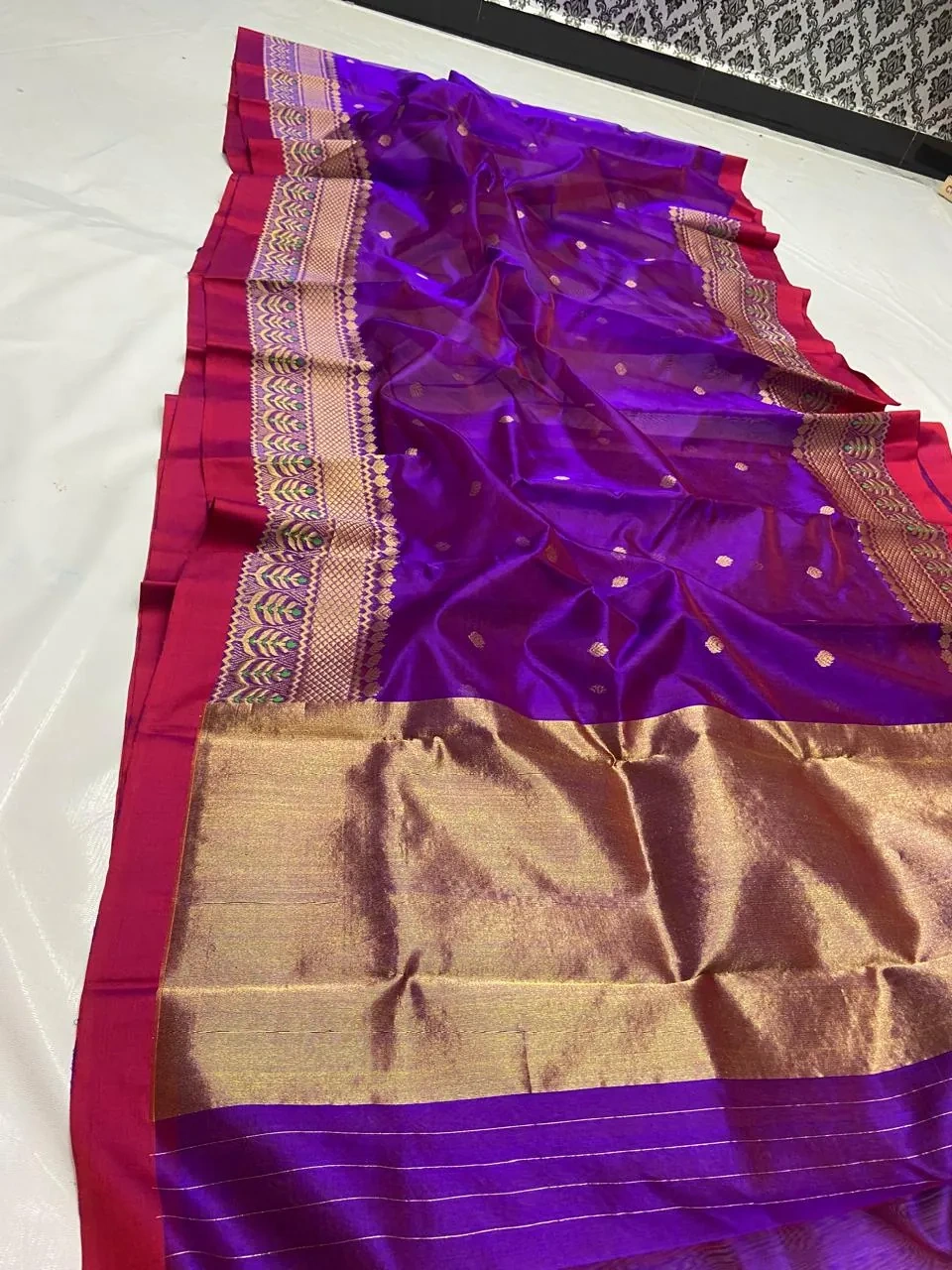 Pure Chanderi silk saree in deep purple with gold zari work, red border, and matching maggam blouse for weddings.