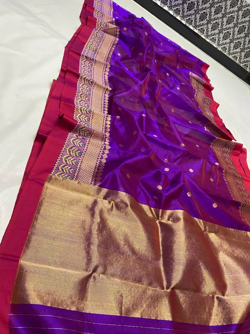 Pure Chanderi silk saree in vibrant purple with gold zari work, red border, and matching maggam blouse for weddings.