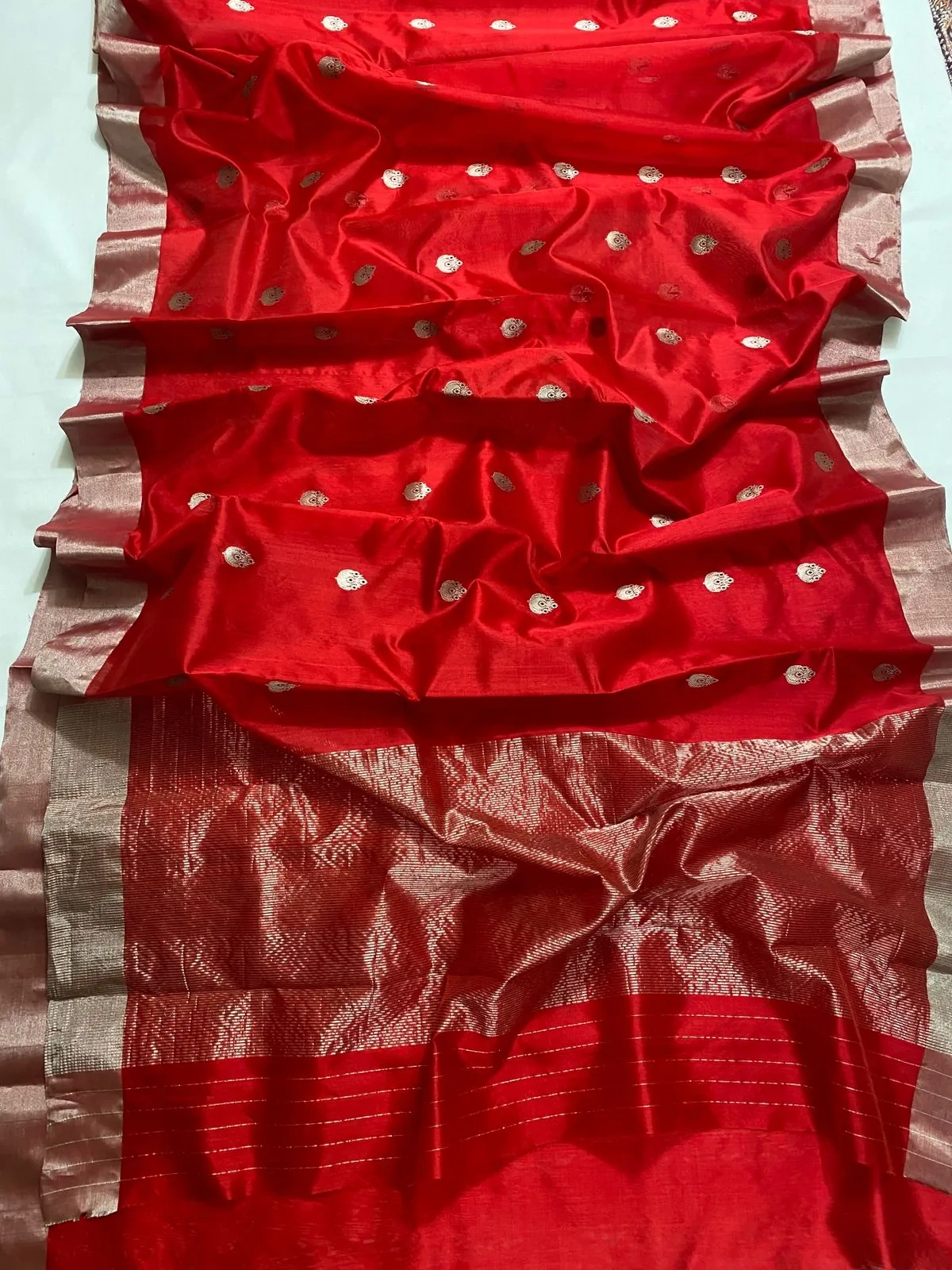 Handwoven pure Chanderi silk saree in vibrant red with gold zari polka dots and a contrasting beige zari border.