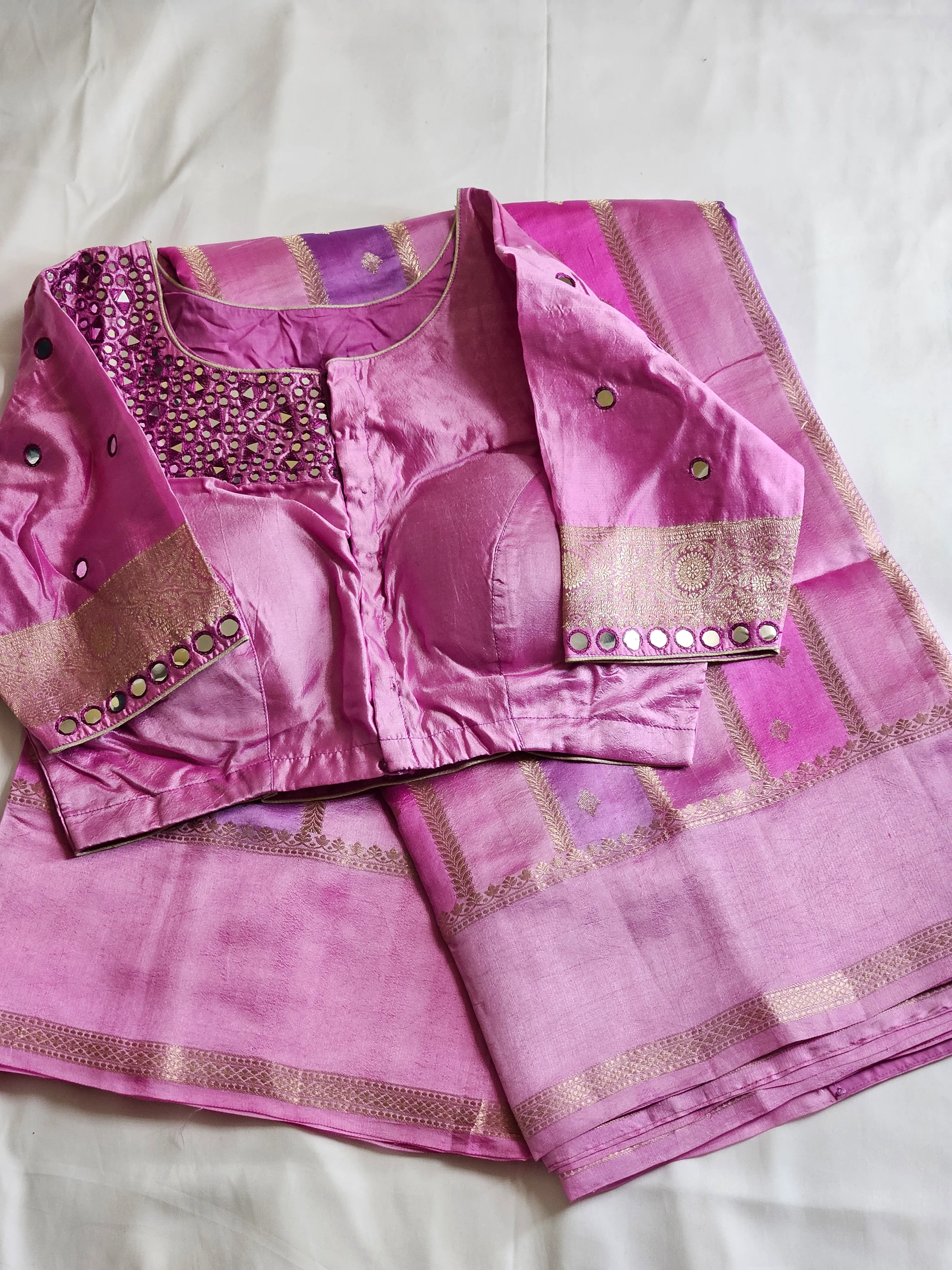 Handwoven pure raw mango silk saree in vibrant yellow with intricate zari border, paired with embellished blouse