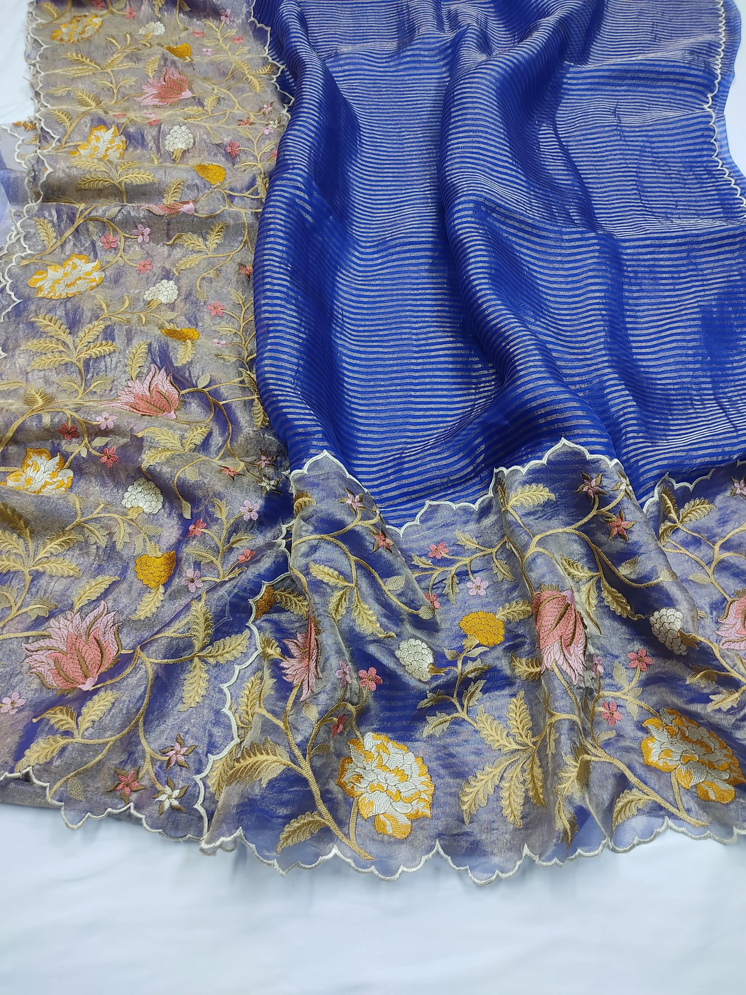 Handwoven pure Banarasi Kora tissue silk saree in royal blue with gold zari and intricate floral embroidery border