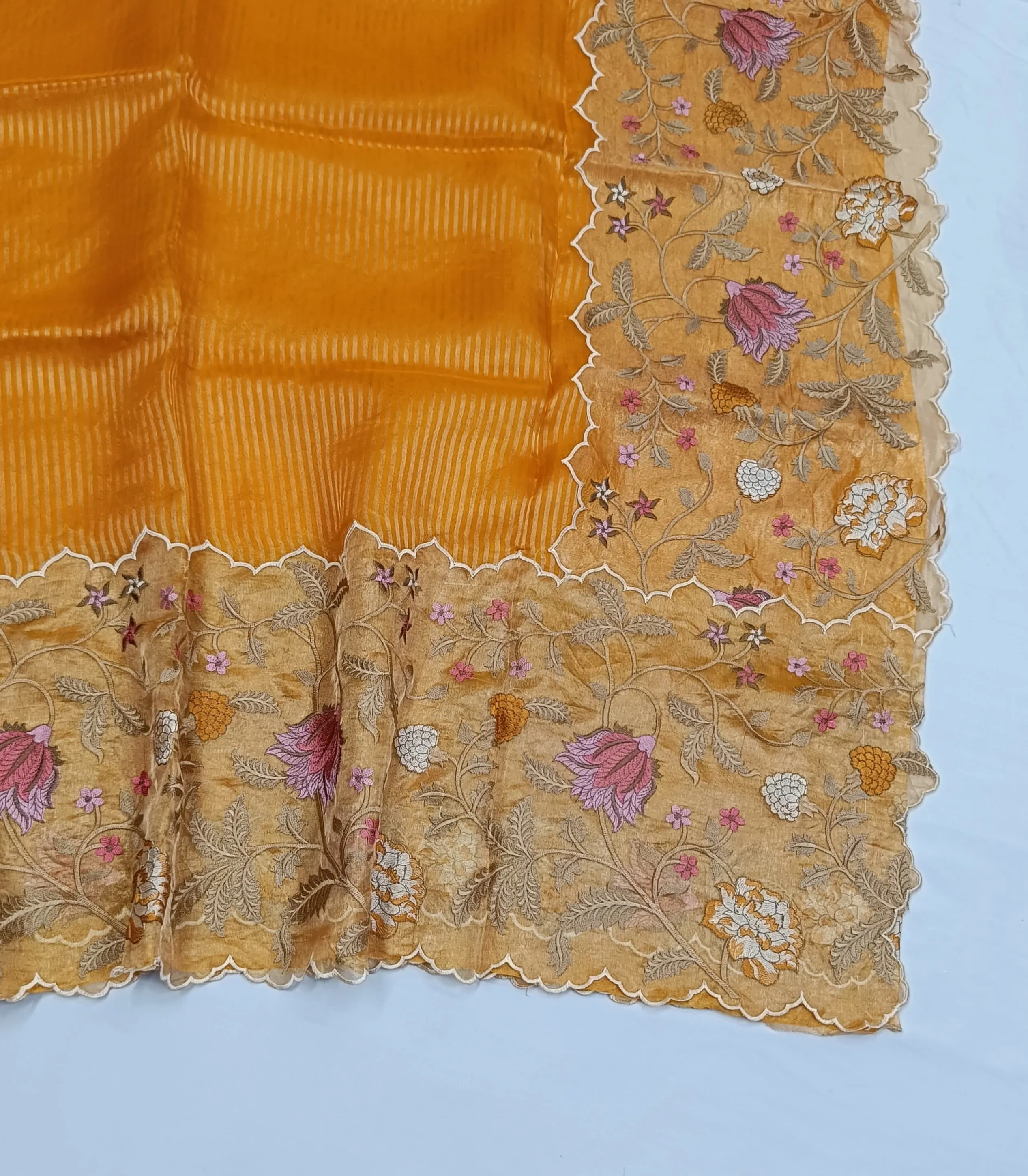 Pure Banarasi Kora tissue saree in gold with intricate handwoven floral zari border, ideal for weddings and festive wear