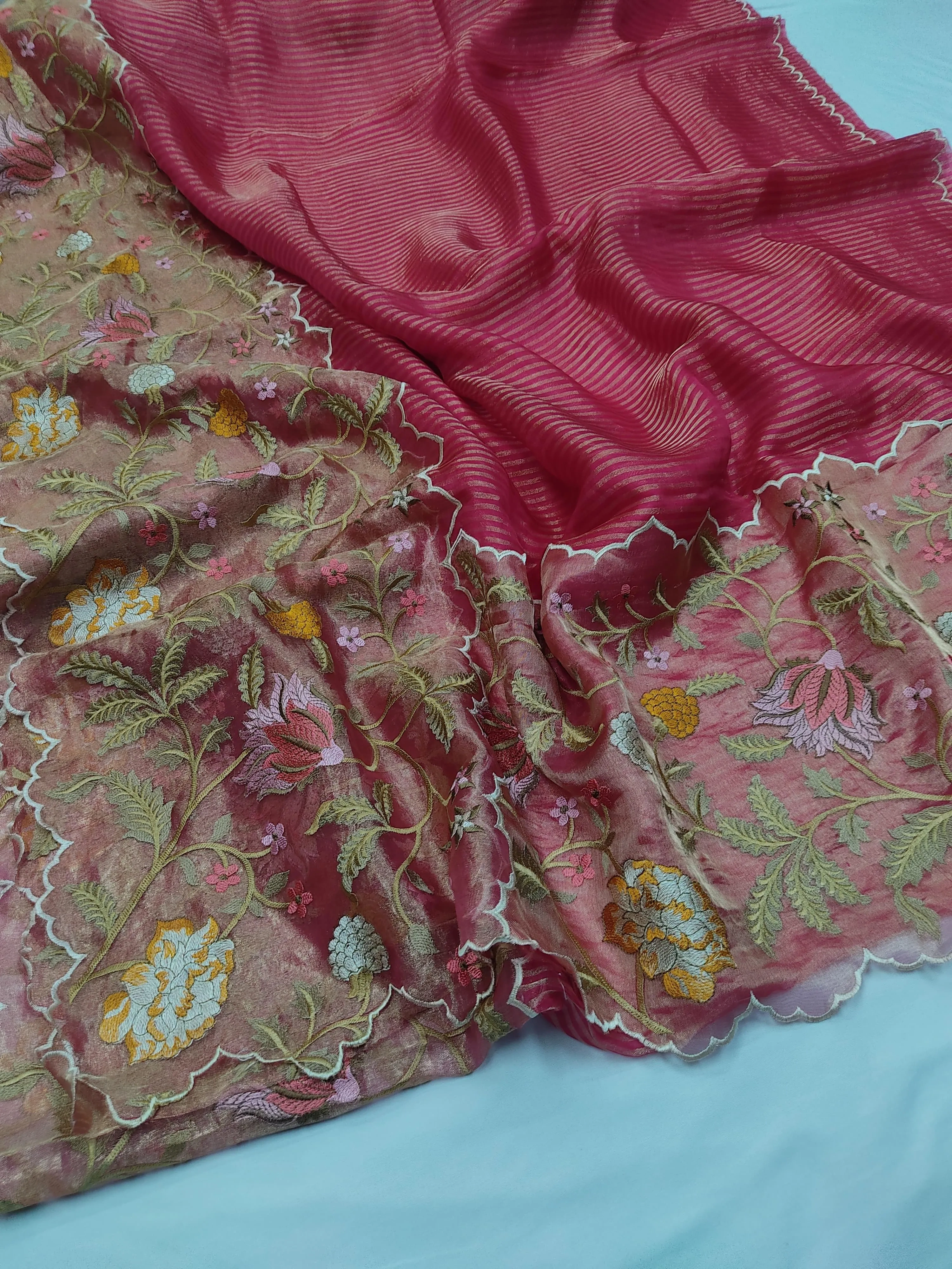 Handwoven pure Banarasi Kora tissue saree in deep pink with gold and silver zari floral embroidery, ideal for weddings
