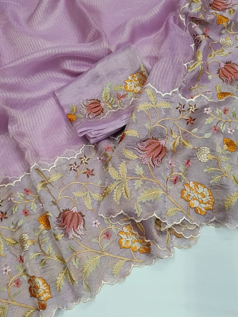 Pure Banarasi Kora tissue saree in pastel lavender with gold and silver zari, floral embroidery, perfect for weddings.