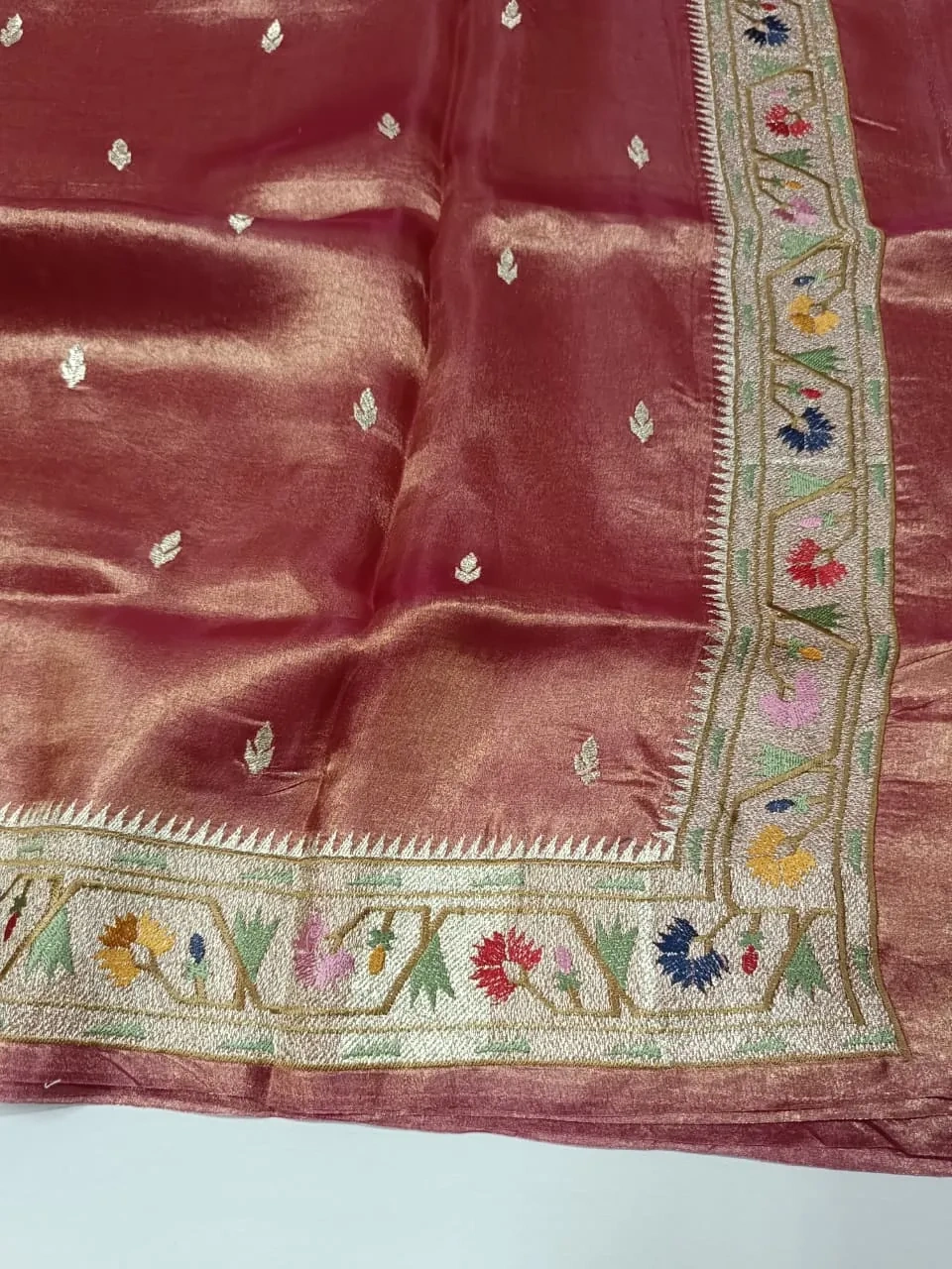 Pure Banarasi Kora tissue saree in rose gold with gold and silver zari, floral woven border, ideal for weddings and festivals