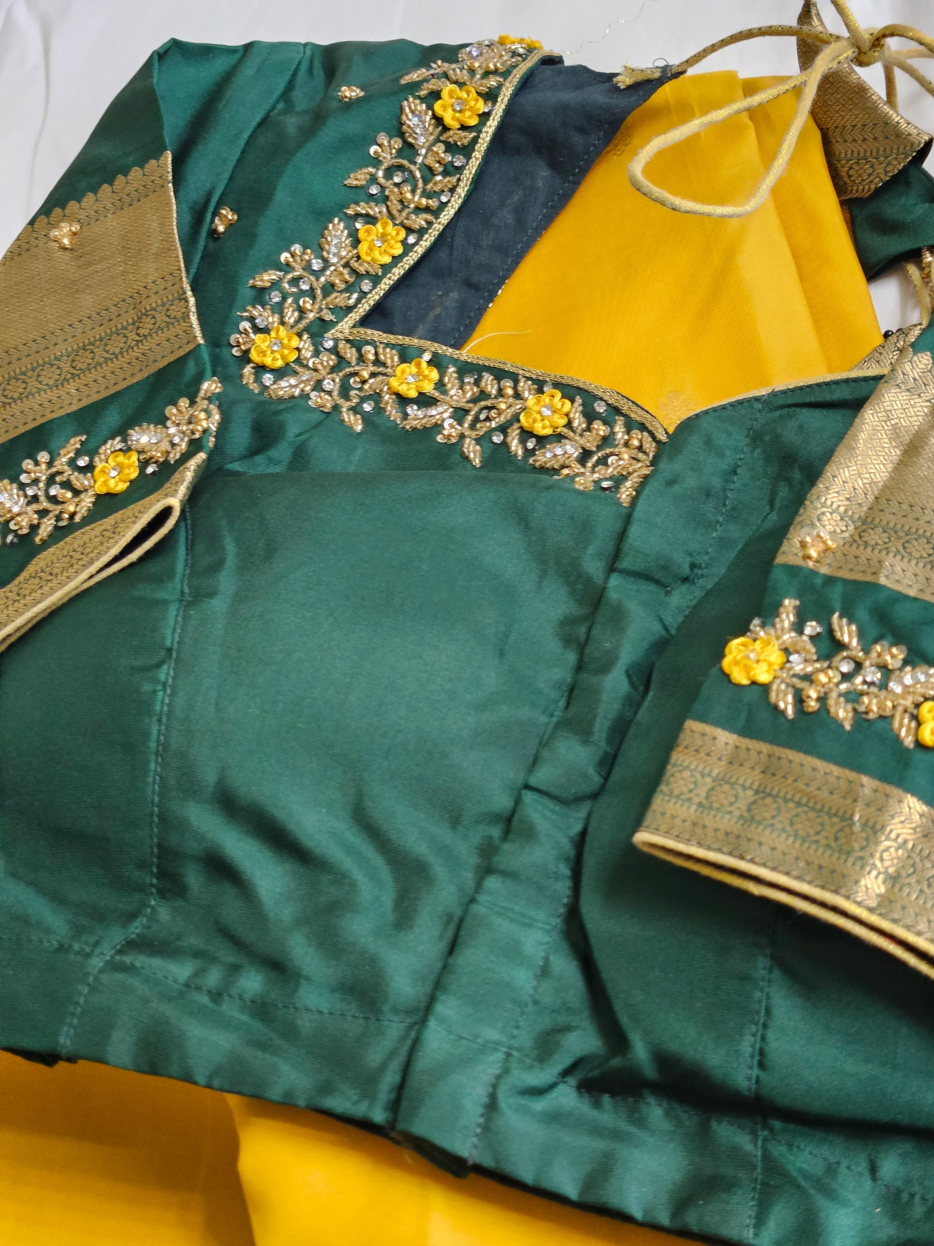 Handwoven pure Kanchipuram silk saree in mustard yellow with green blouse, gold and silver zari, floral embroidery