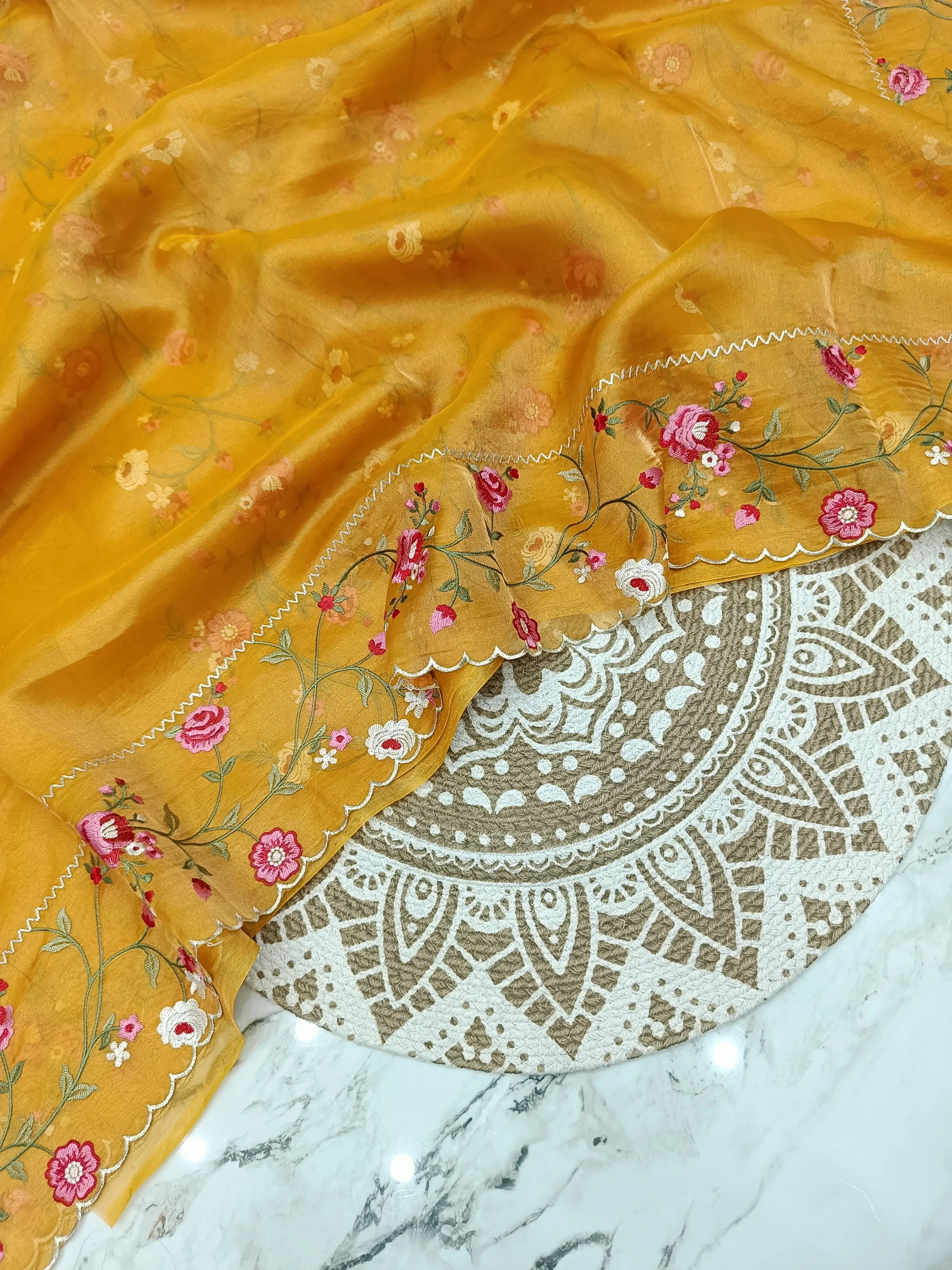 Handwoven Banarasi tissue saree in gold with silver zari, featuring floral embroidery and scalloped border, luxury wedding wear
