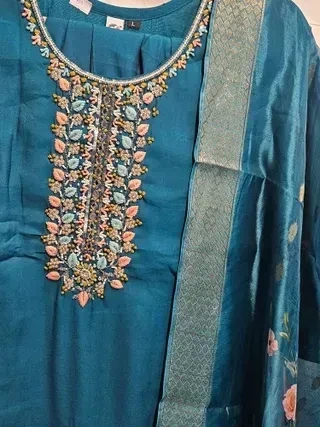 Gold pure Dola silk kurti set in teal blue with intricate floral embroidery and matching embroidered dupatta, festive ethnic wear.