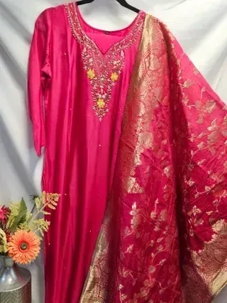 Pure Dola silk maroon Indian dress with intricate golden embroidery and matching dupatta, ideal for weddings and festivals