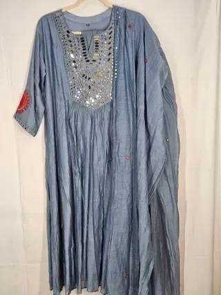 Pastel blue Chanderi silk suit set with mirror work on the neckline, handcrafted for Indian weddings and festive wear.