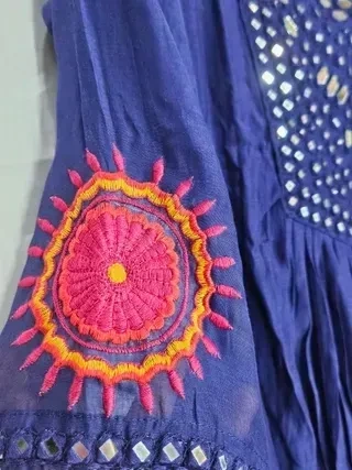 Mul Chanderi silk wedding suit set in deep blue with mirror work and vibrant pink-orange embroidered floral motif on sleeve