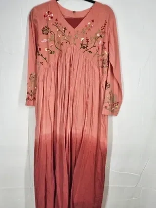 Handcrafted pastel pink mul cotton kurta set featuring delicate floral embroidery on the bodice and sleeves, festive Indian wear