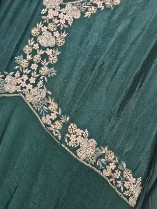 Handcrafted pure chinon Anarkali gown in deep teal with intricate silver floral embroidery, ideal for weddings and festive occasions