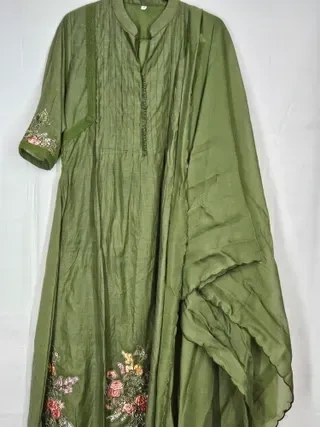 Pastel green Chanderi silk suit set with floral embroidery on sleeves and hem, paired with matching dupatta, ideal for weddings.