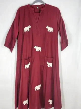Handcrafted mul cotton ethnic frock in deep maroon with white elephant motifs, three-quarter sleeves, and front pockets