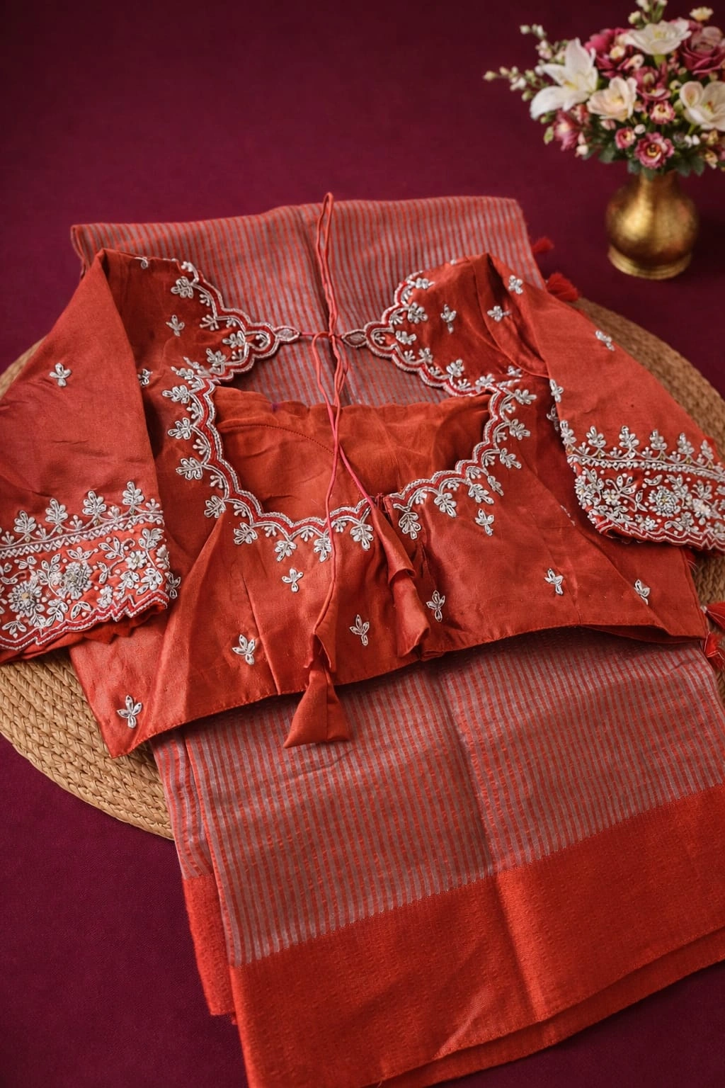 Gold Banarasi Kora tissue silk saree with intricate zari motifs, paired with a matching embroidered blouse, ideal for weddings.