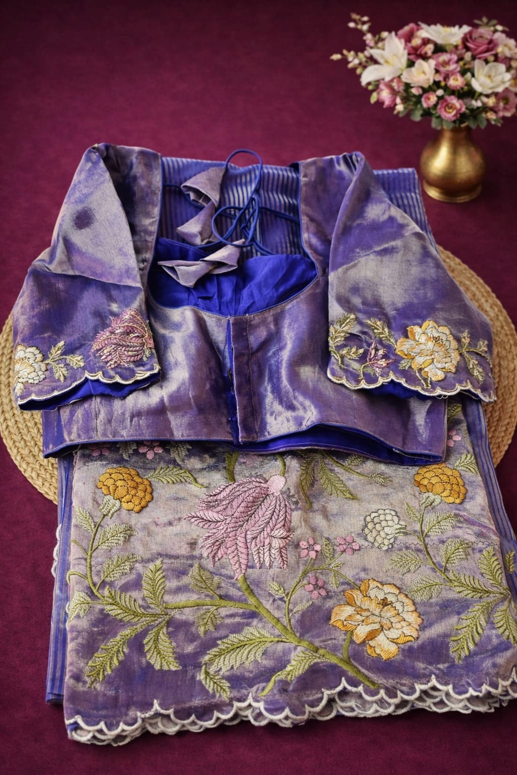 Pure Banarasi Kora Tissue saree in lavender with intricate gold and silver floral embroidery, paired with matching blouse.