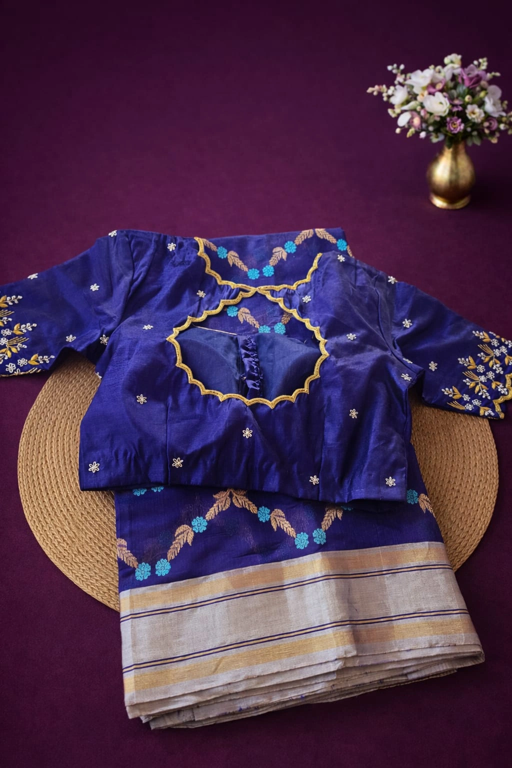 Handwoven pure Chanderi Pattu silk saree in silver and blue with zari border, paired with embroidered blue blouse